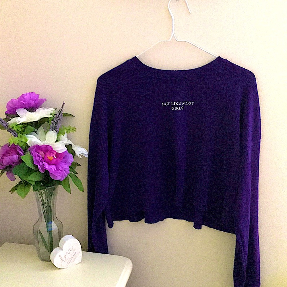 Cropped long sleeve “Not Like Most Girls” purple